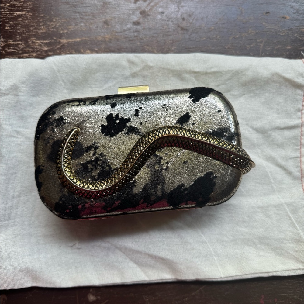 Black and gold snake clutch